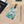 Island Hopping cruise luggage tag with sea turtle, tropical islands, flowers, palm leaves, and black strap