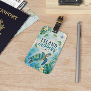 Island Hopping cruise luggage tag with sea turtle, tropical islands, flowers, palm leaves, and black strap