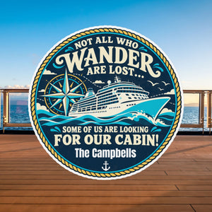 Round navy and teal cruise door magnet with a ship, compass and gold rope border. Text reads “Not all who wander are lost… some of us are looking for our cabin!”