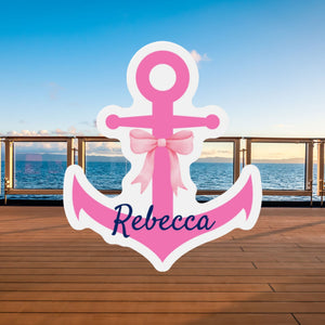 Pink anchor-shaped magnet with a light pink printed bow, white border and navy script