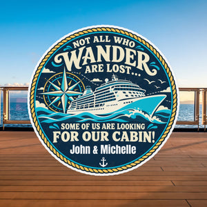 Round navy and teal cruise door magnet with a ship, compass and gold rope border. Text reads “Not all who wander are lost… some of us are looking for our cabin!”