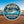 Round navy and teal cruise door magnet with a ship, compass and gold rope border. Text reads “Not all who wander are lost… some of us are looking for our cabin!”