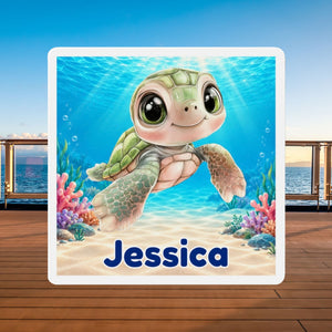 Square personalized cruise door magnet with a blue baby sea turtle, underwater coral scene