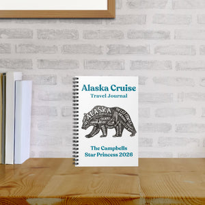 Personalized Alaska Cruise Travel Journal with bear word art design, custom family name, ship name, and year on a spiral notebook cover