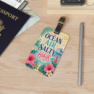 Ocean Air Salty Hair cruise luggage tag with tropical flowers, ocean waves, cruise ship artwork, and black leather strap