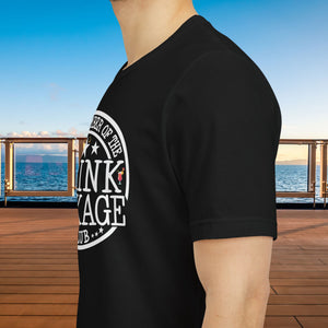 Drink Package Club cruise T-shirt with white circular badge lettering, stars, gold anchors, and colourful cocktail graphics.